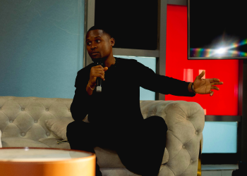 Man presenting with microphone